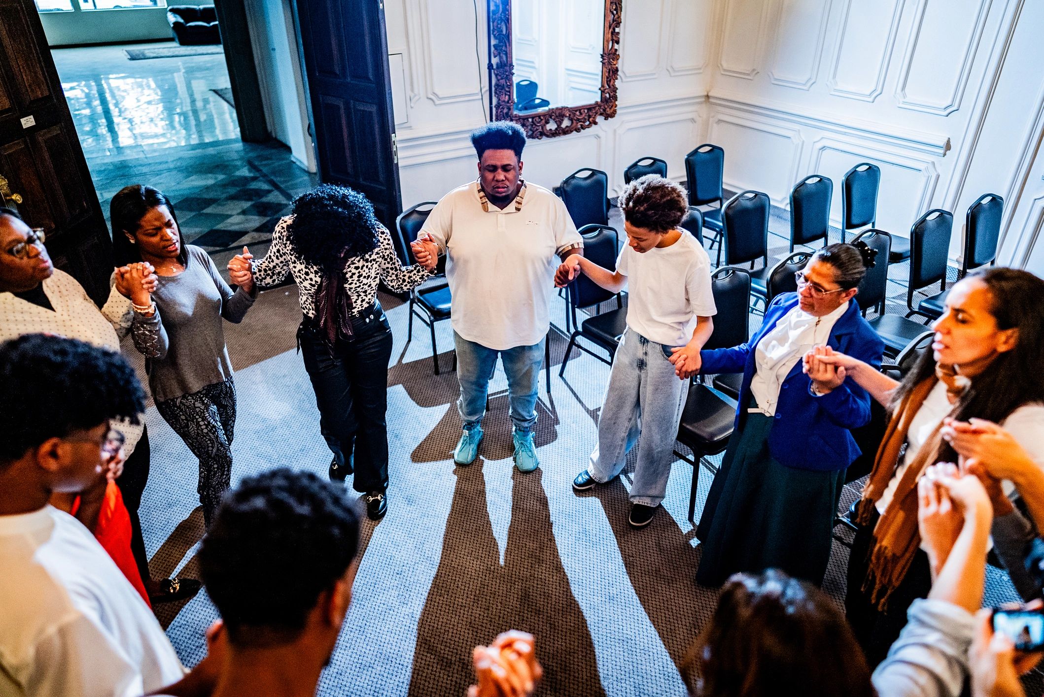 People praying together in church with passion